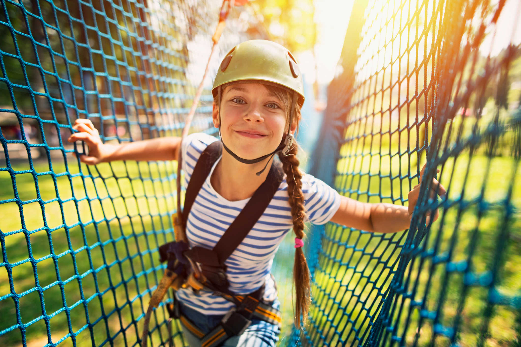 A child enjoying herself at an adventure course