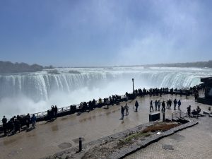 Tourisits from a Niagara Falls guided tourexploring the viewing area