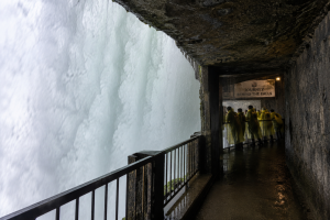 View from Journey Behind the Falls observation tunnel showing powerful water curtain at Horseshoe Falls