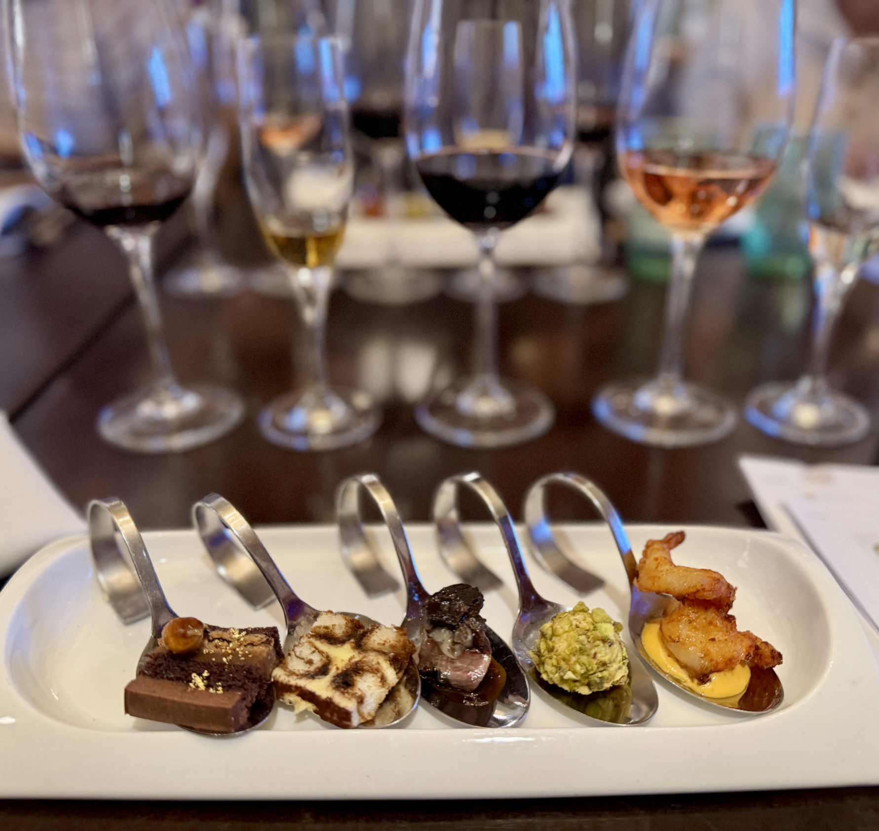 Wine tasting flight featuring Icewine and local Niagara wines at a winery